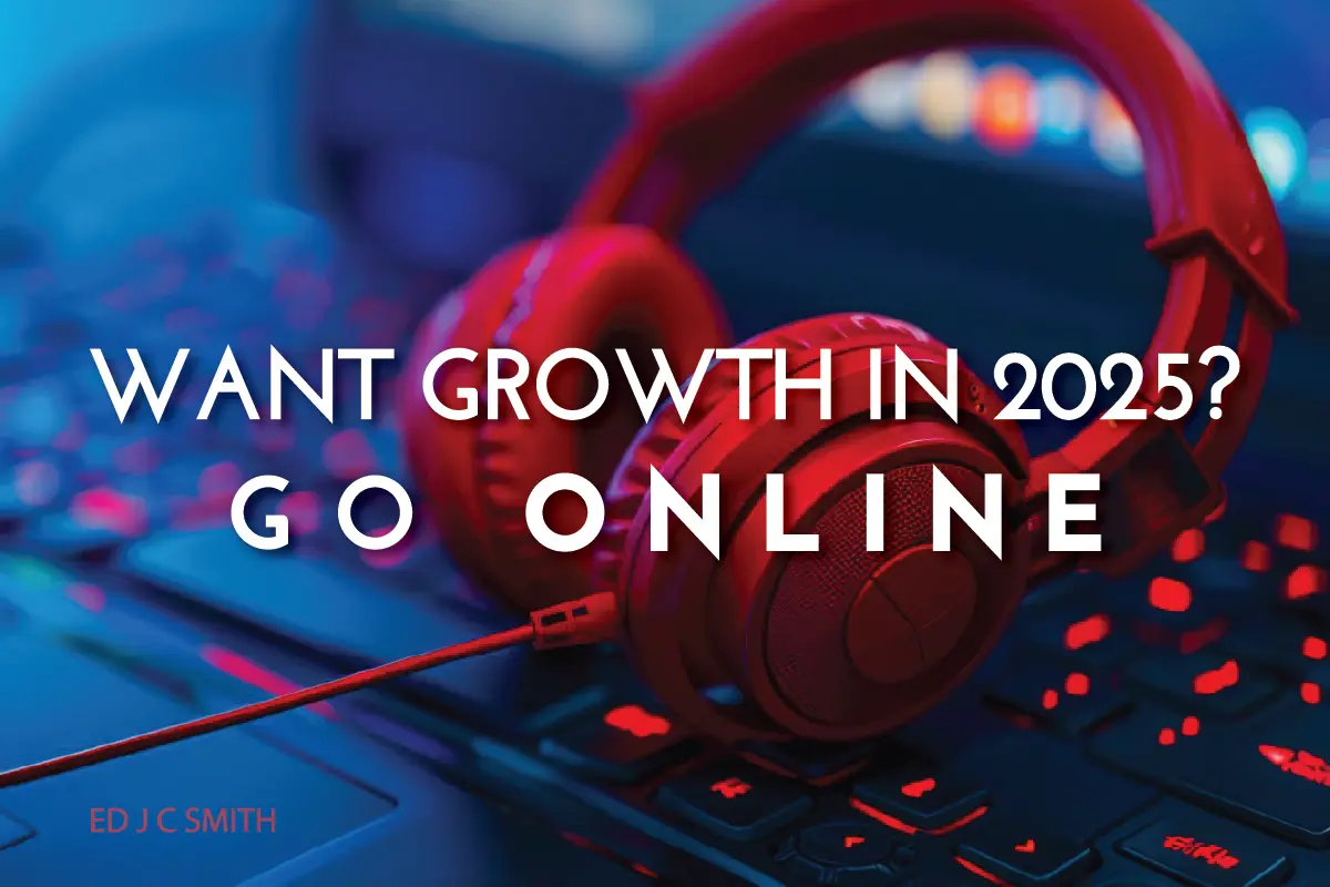 how to start an online business concept with “Want growth in 2025? Go online” over red headphones on a laptop keyboard in neon lighting