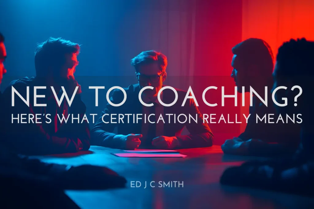 group of professionals discussing coaching certification in a modern meeting room with dramatic red and blue lighting